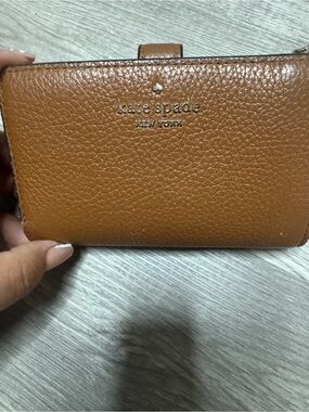 kate spade Pebbled Leather Bifold Wallet in Tan Brown